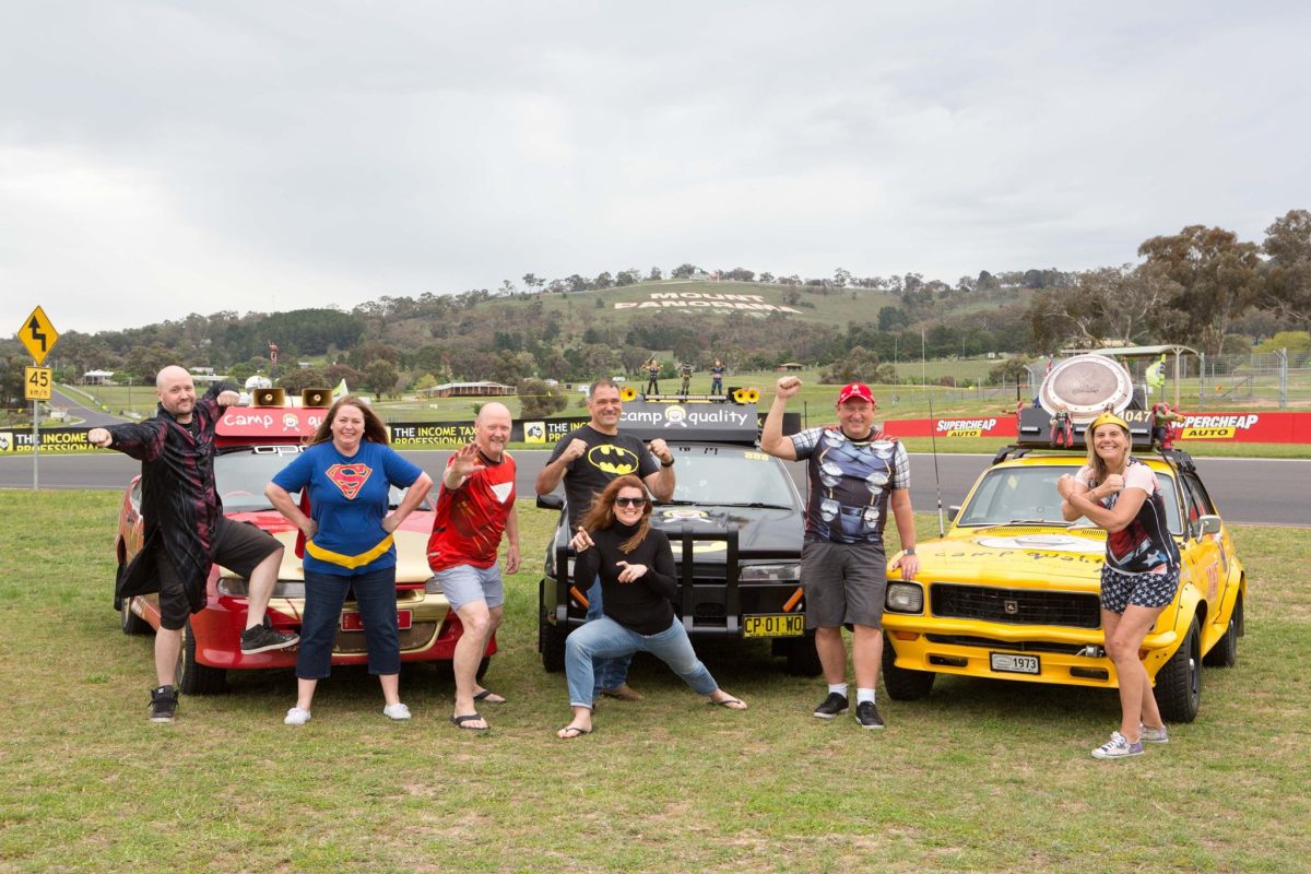 The SuperHeros ACT team uniting at Mount Panorama in Bathurst. Photo: Camp Quality Classic Cruise, Facebook.