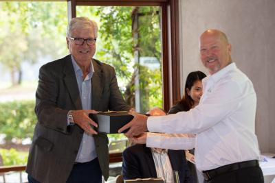 Outgoing Hands Across Canberra CEO Peter Gordon, with OPC managing director Brett Norton, discussed HAC’s work at OPC’s latest quarterly seminar for NFPs. Photo: Thomas Lucraft.